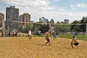 People playing beach volleyball