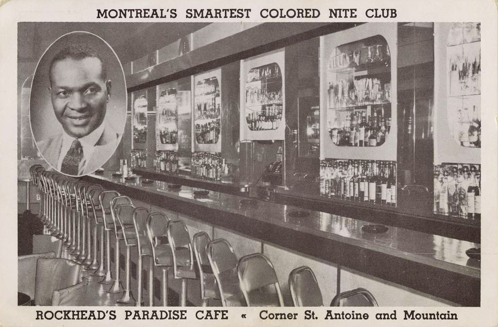 Carte postale montrant l'intérieur du café Rockead's Paradise et son propriétaire en médaillon