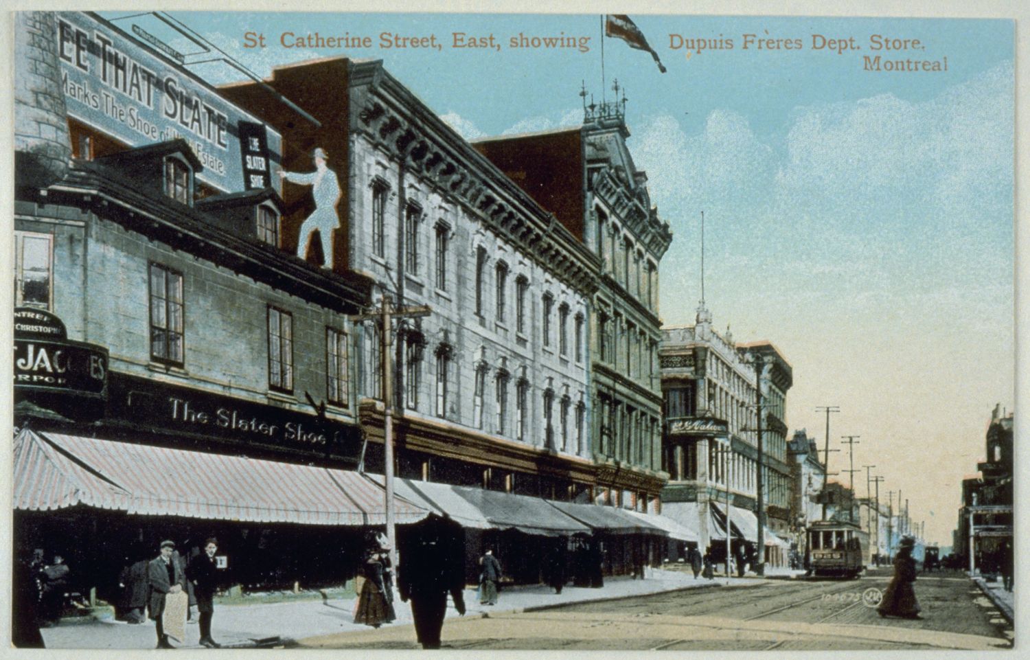 Carte postale colorisée montrant la rue Sainte-Catherine et les façades de magasins côté nord.