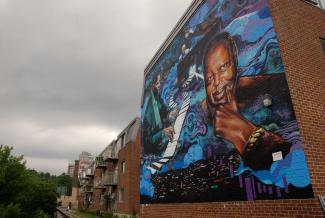 Murale intitulée \"Jazz born here\" au coin de la rue des Seigneurs et de la rue Saint-Jacques