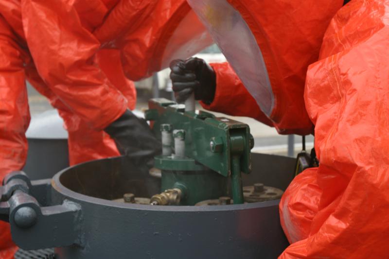 Two firemen during a dangerous materials simulation. 