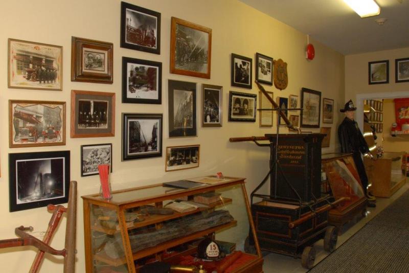 Photos and items from different eras at the Montréal Firefighters' Museum
